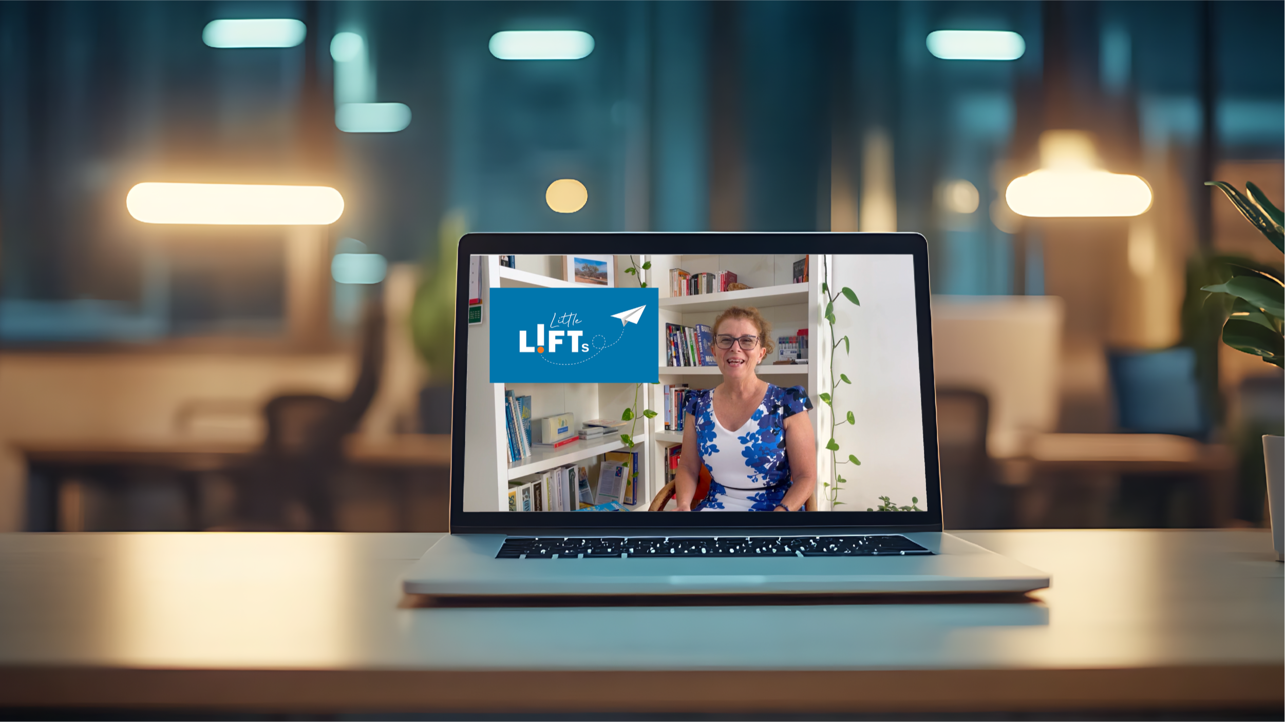 Cherelle presenting Little LIFTs on laptop screen in atmospheric library space