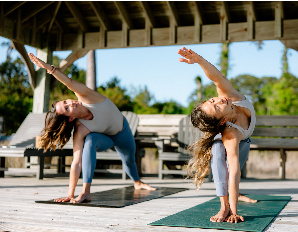 Julia and Lalai — expert movement instructors specializing in strength, flexibility, and mobility.