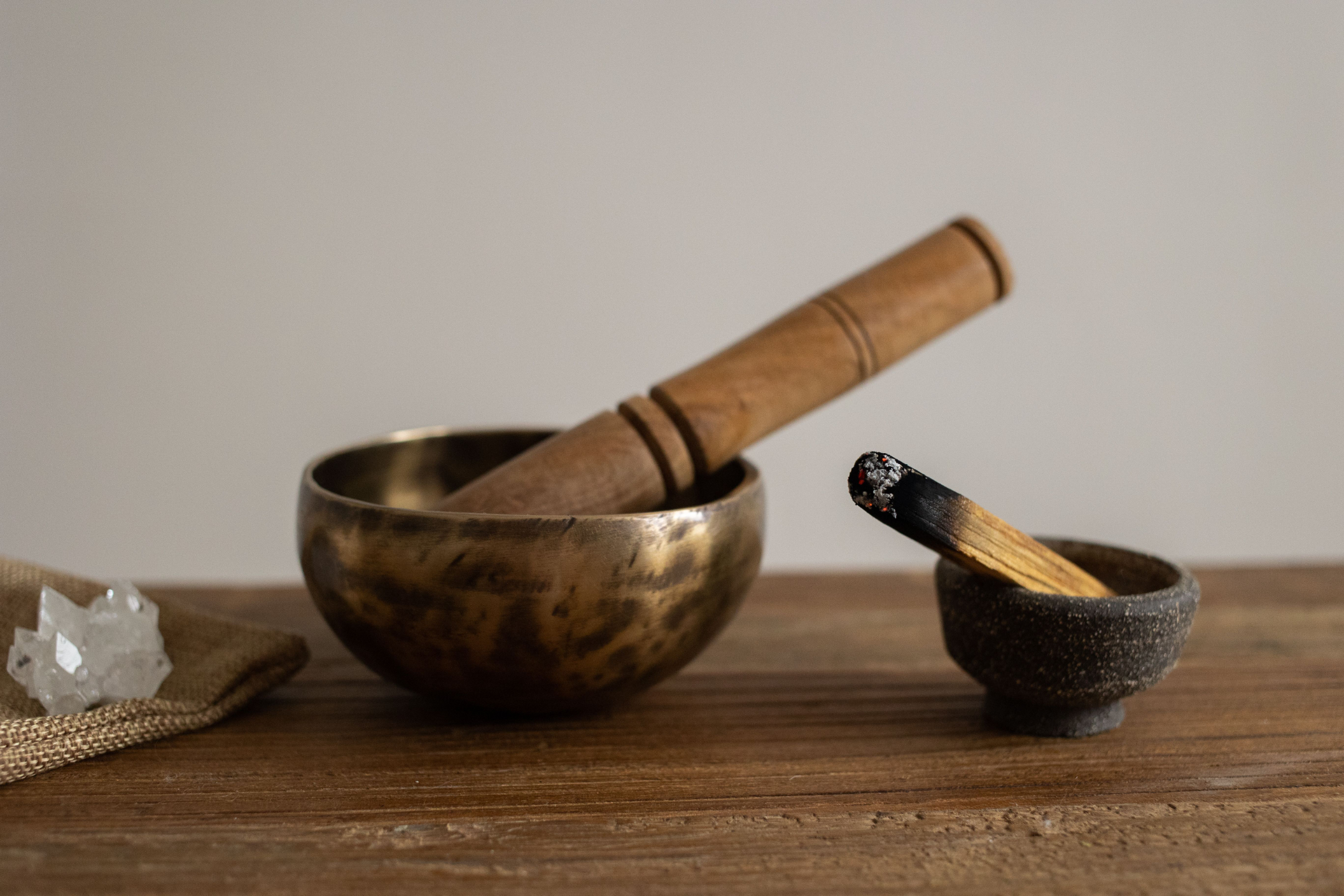 Sound bowl with incense and crystal.