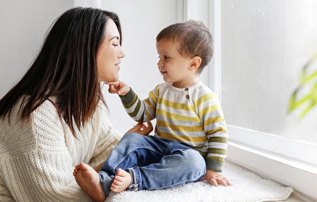 child listening to their mother