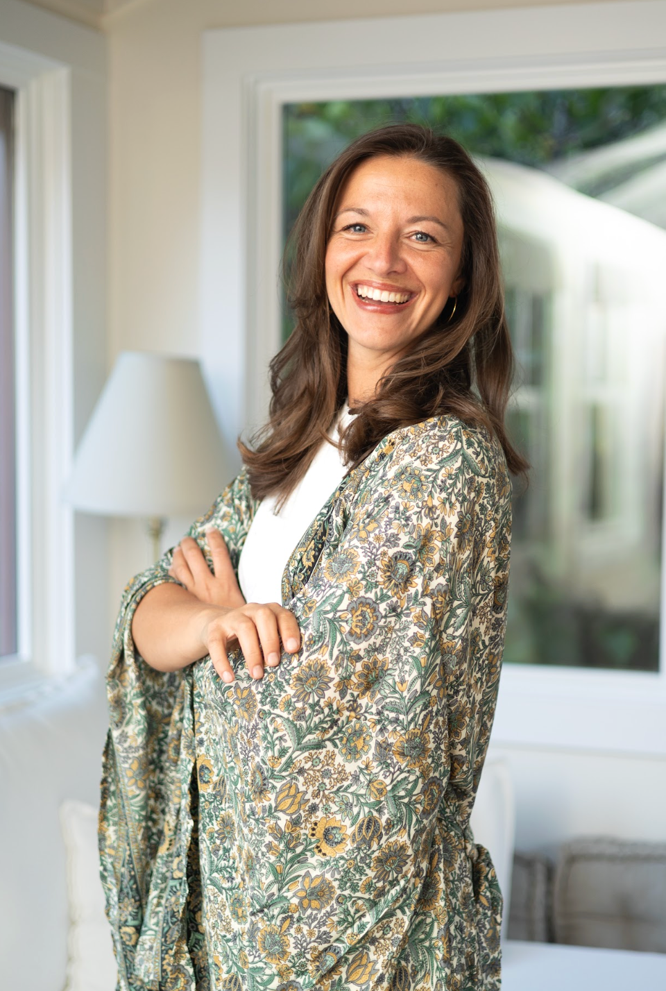 Steffi Seefeld, somatic coach and founder of Not Your Fault Not Your Future, smiling into camera
