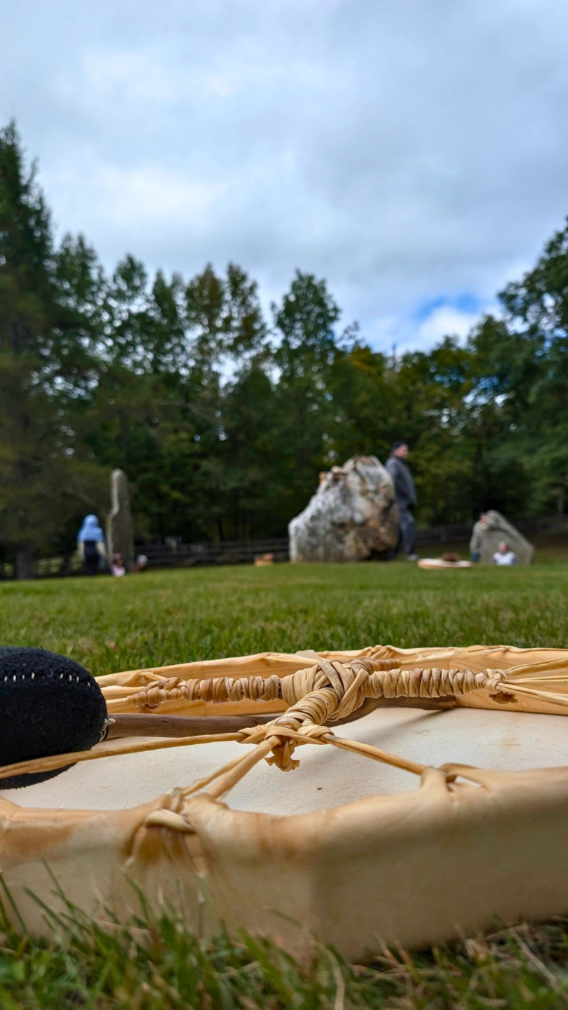 close-up of hide drum upside down on grass