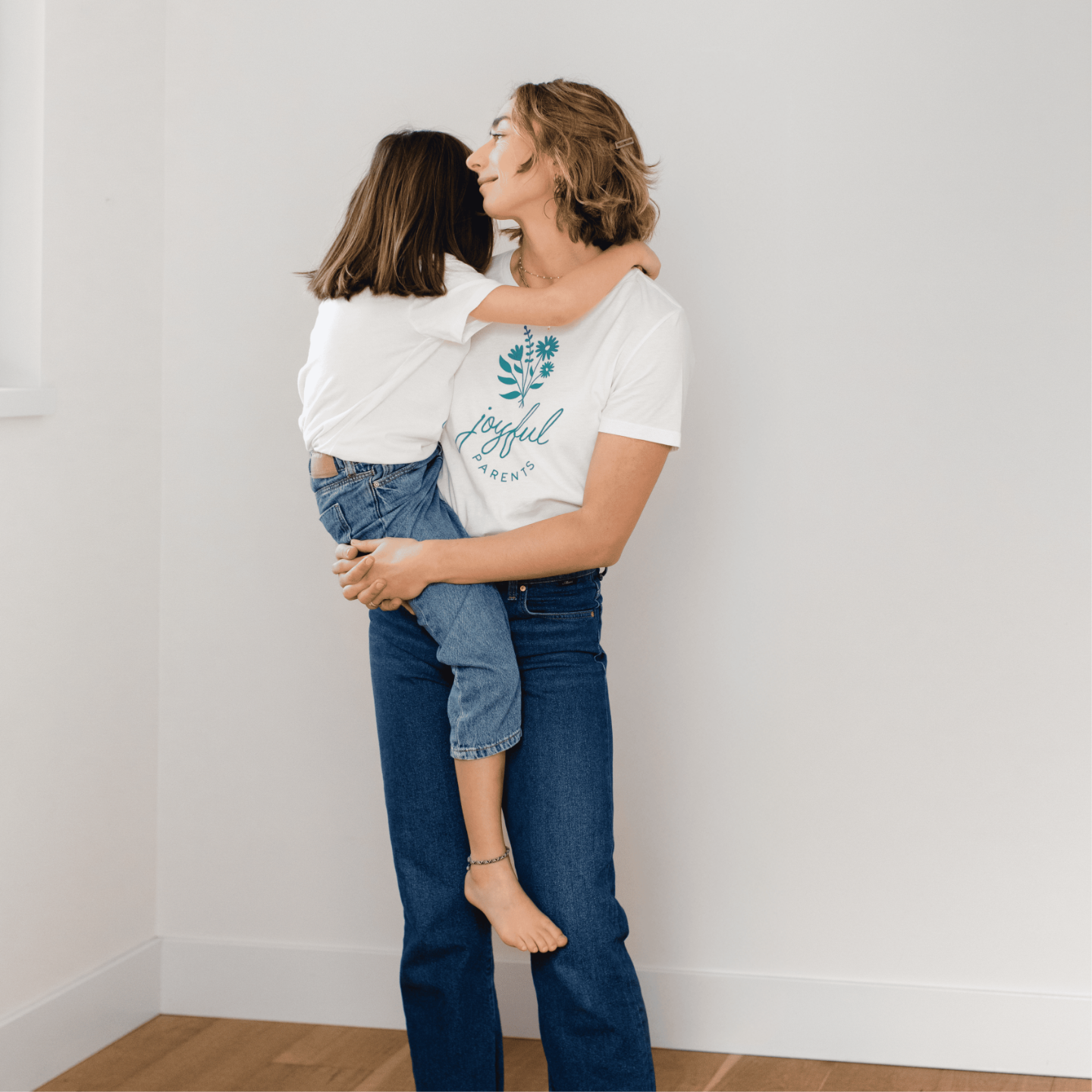 Holding daughter standing