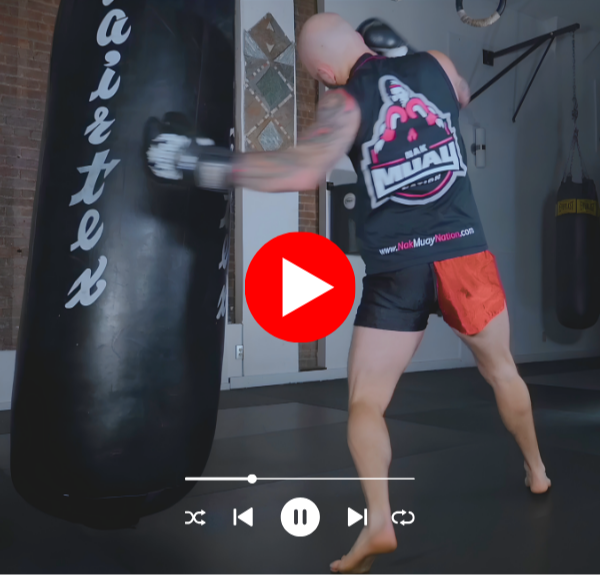 Muay Thai training on the heavy bag.