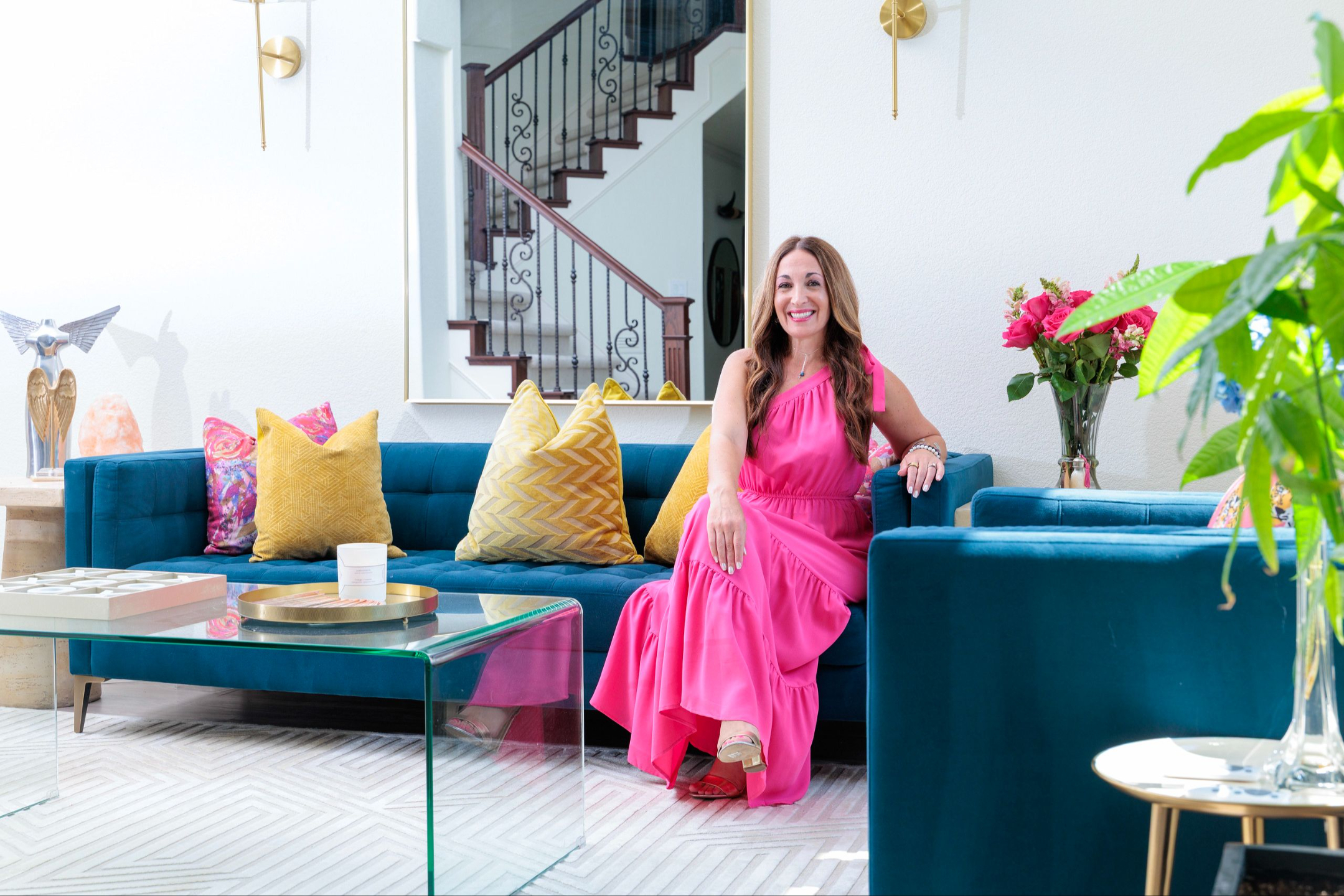 Gina Nicole in her jewel-toned living room