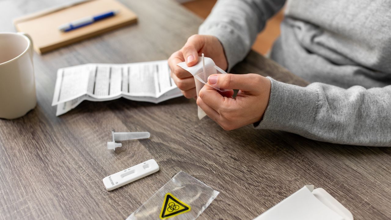 At-home test kit being prepared for postal return to lab