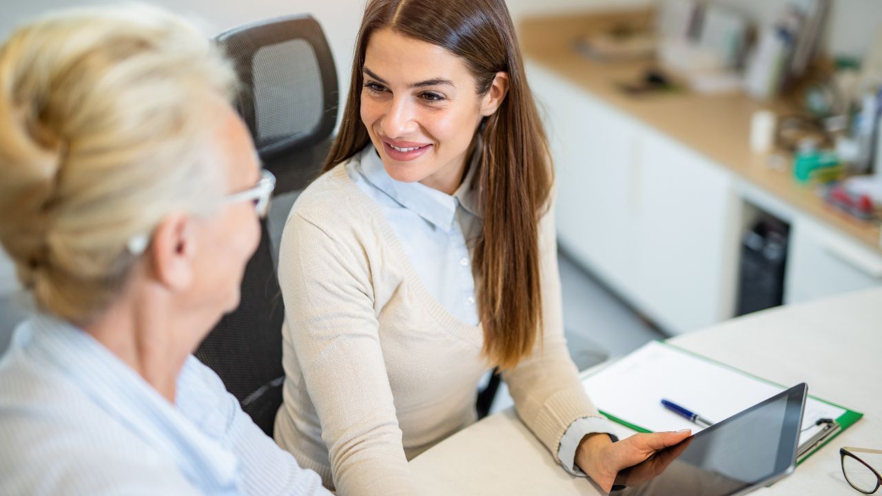 Nutritional therapist explaining personalised test results and health plan