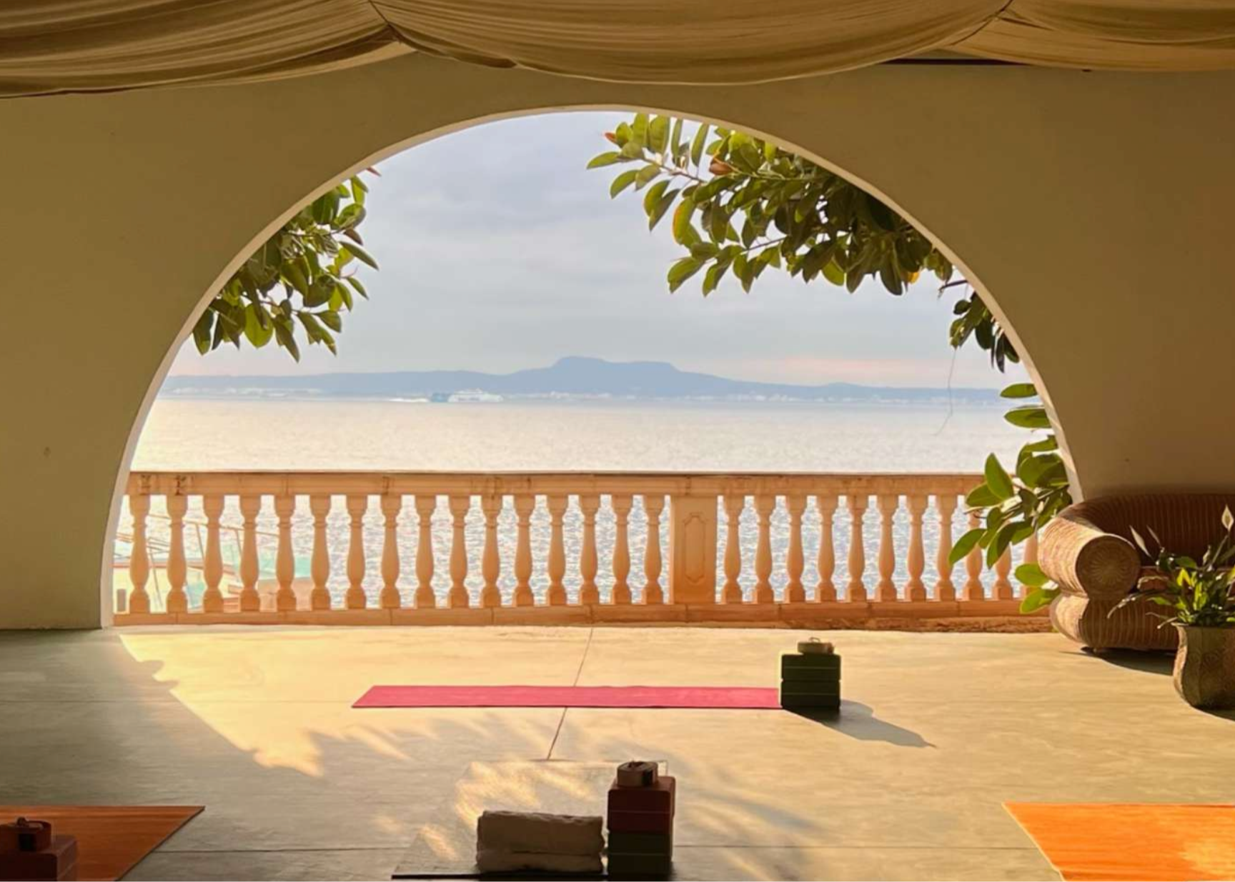 Morning wellness session overlooking the sea