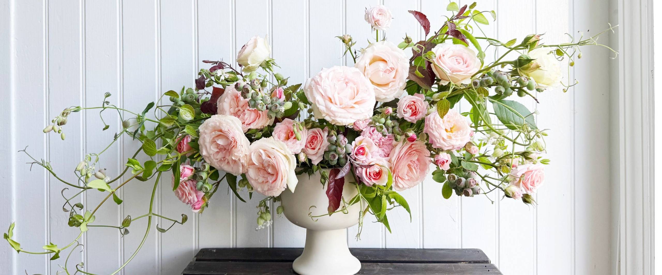 garden roses - eden roses flower arrangement with blueberries and clematis 