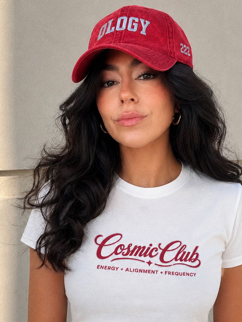 Woman wearing the red OLOGY 222 cap