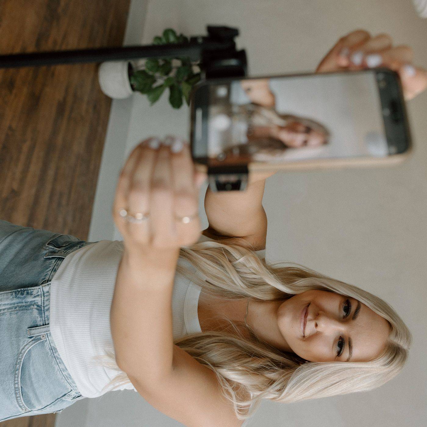 Kelsey Kooima filming content for her home decor Instagram account