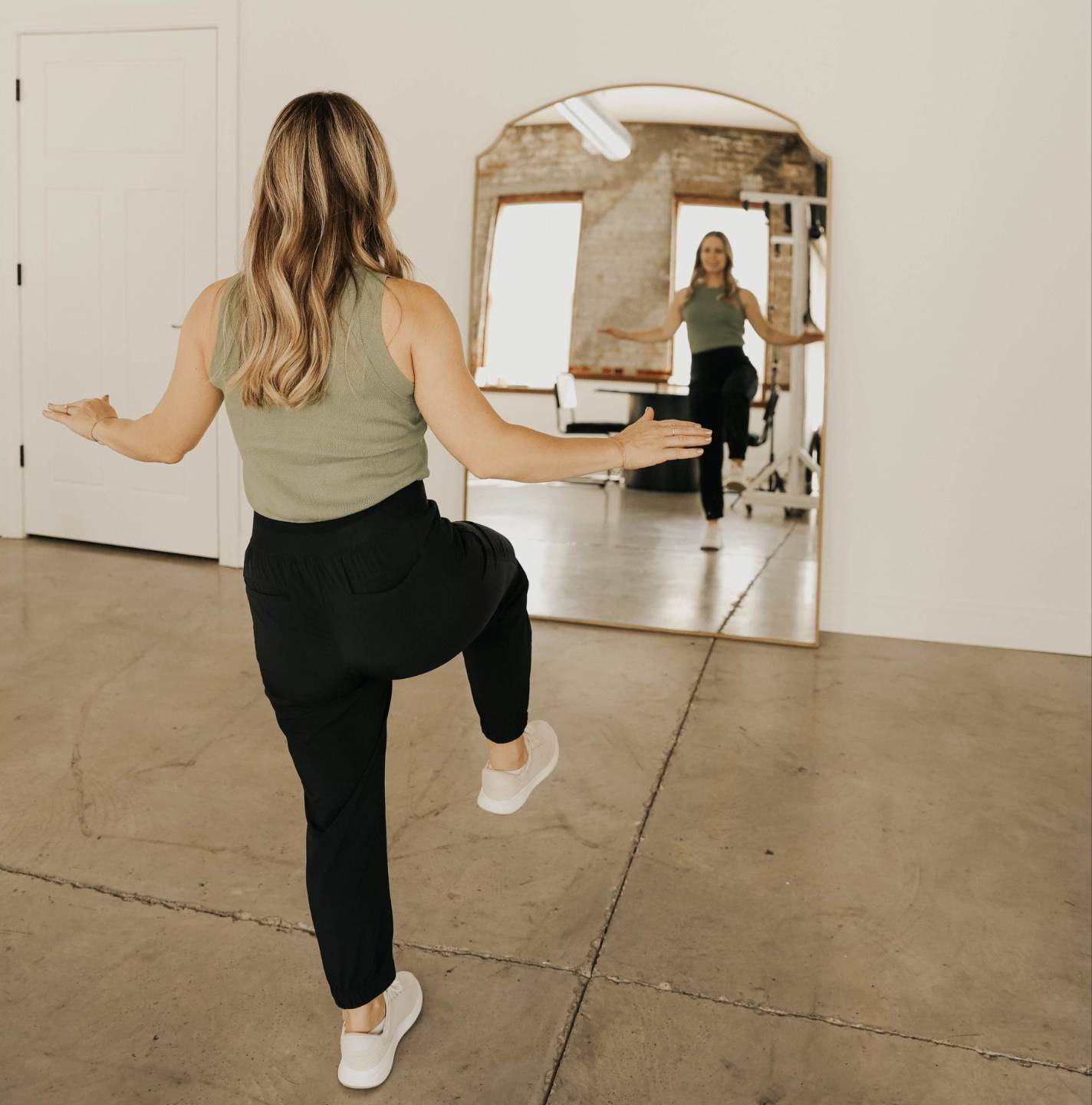 Dr. Gretchen Hawley marching in place during an exercise demo