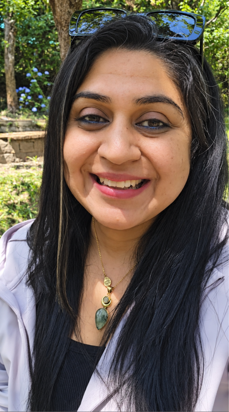 Shreya Talwar smiling outdoors in nature