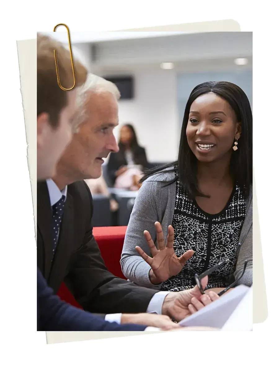 Black female lawyer in a warm conversation with a senior colleague acting as a sponsor