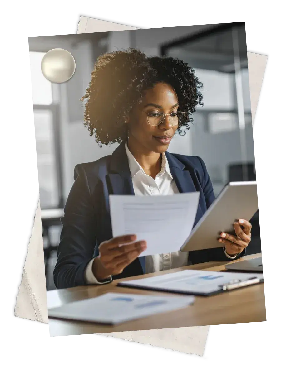 Black female lawyer reviewing her case results and impact on a tablet