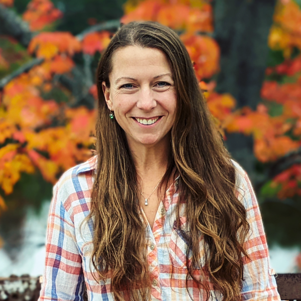 June Link, founder of Discover Superior Joy, outdoors in autumn.