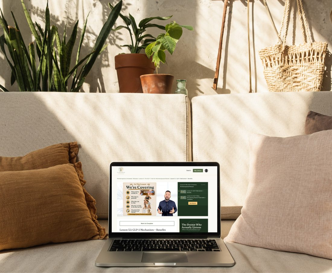 Perimenopause Unmasked course on a laptop