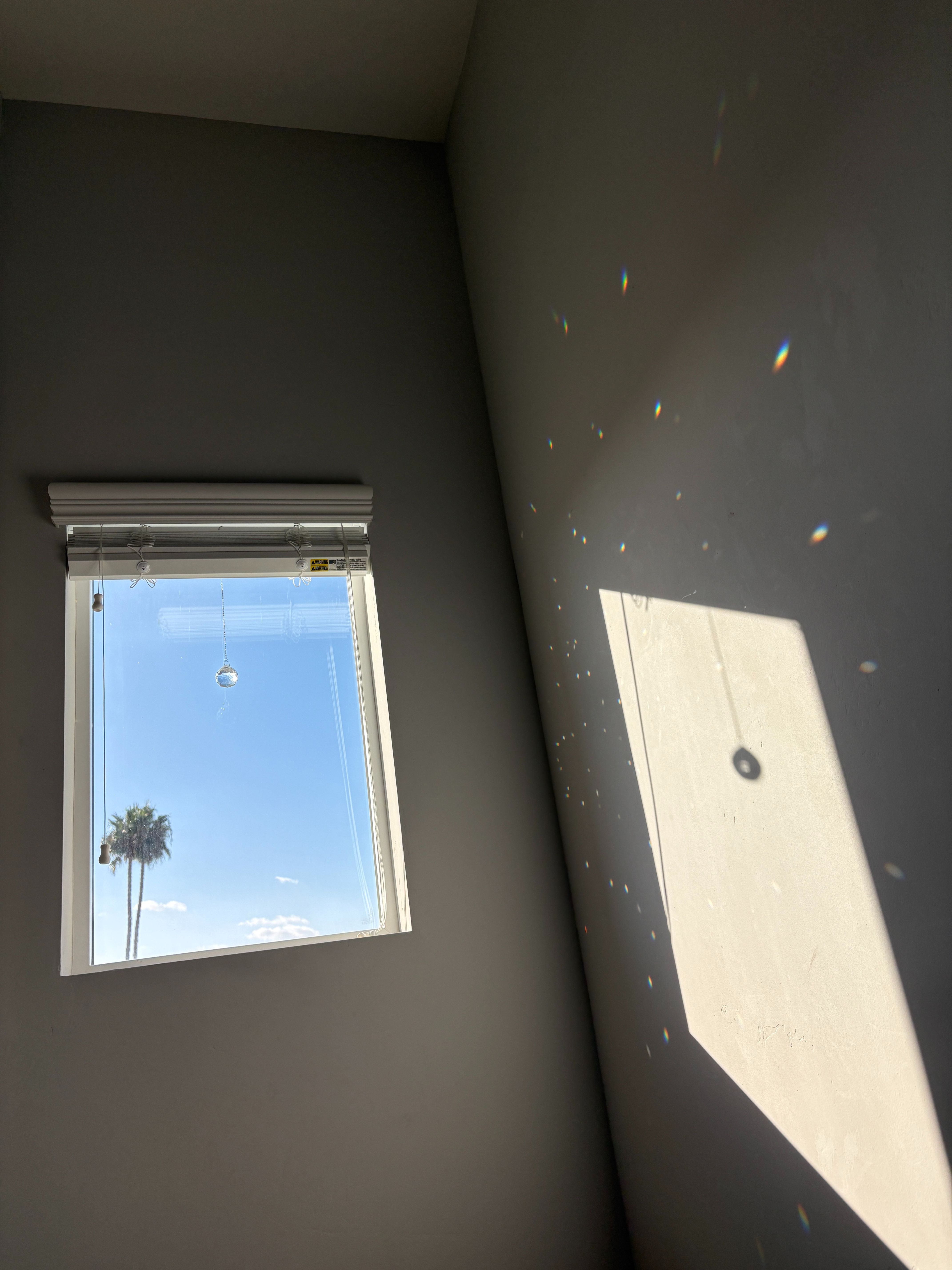 september crystal sky and rainbow walls