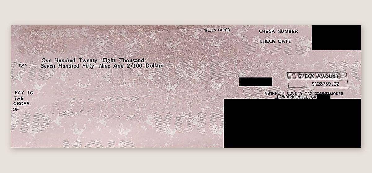 Gwinnett County, GA treasurer check for $128,759.02 recovered by Overage Acquisition