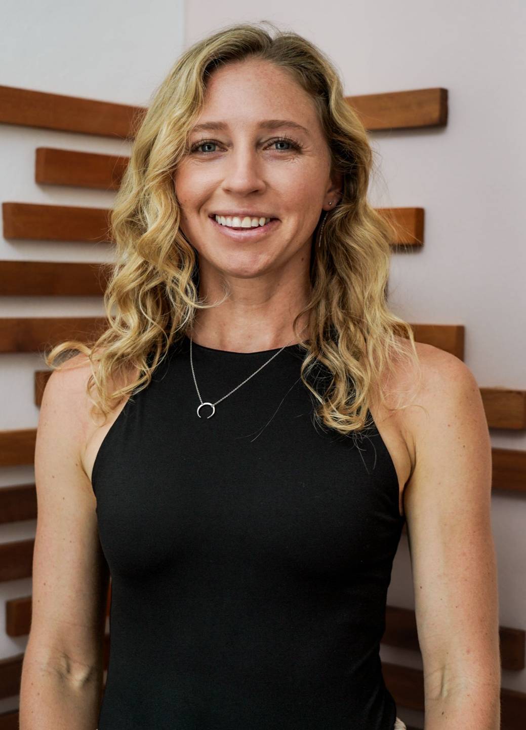 Maeve Downey, breathwork facilitator and somatic therapy practitioner, smiling