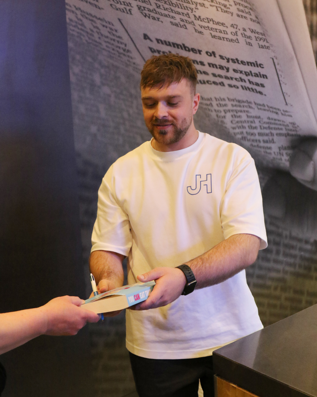 Joshua signing copies of You Can Eat That