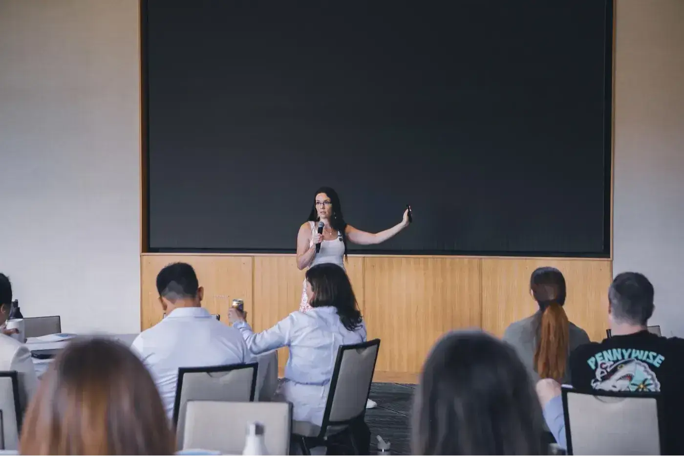 Laura DiBenedetto speaking to a live audience