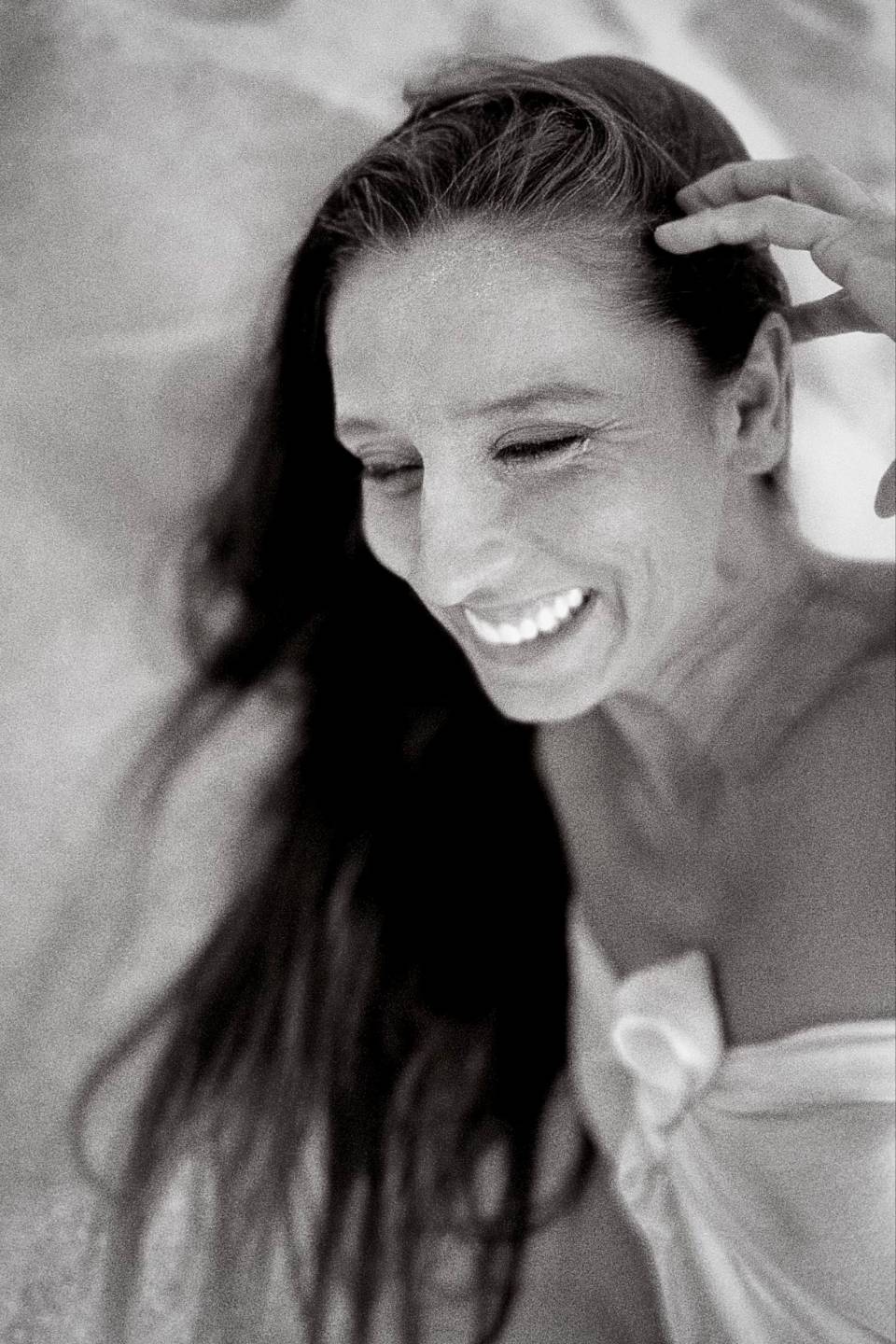 Close profile portrait of Réka Fodor with a mirror