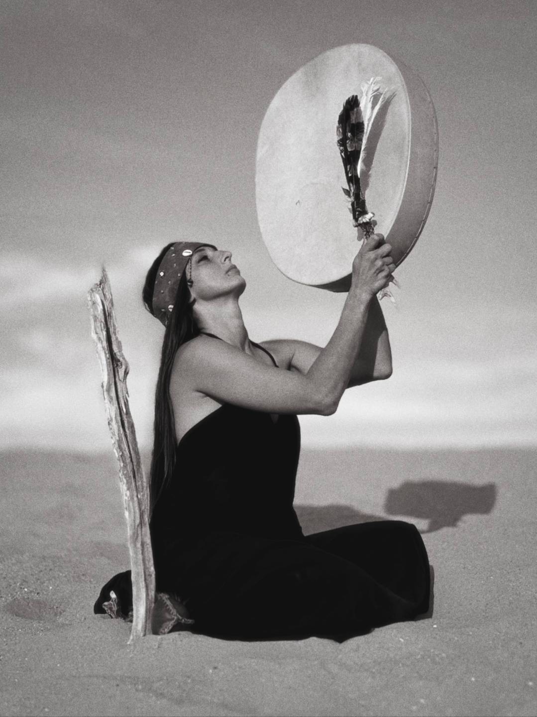 Close portrait of Réka Fodor holding a drum