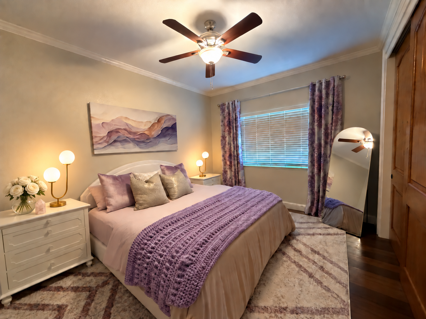 The Archangel Haniel guest room in soft lavender with globe lamps and white roses