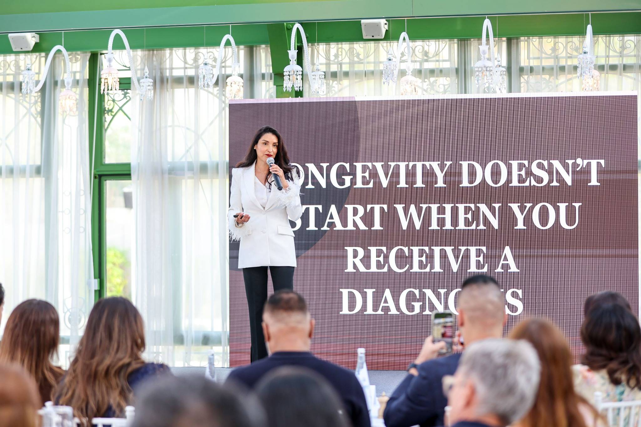 Dr. Sandy speaking about healthy longevity