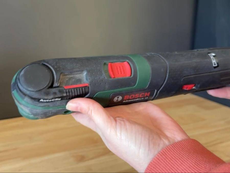 A multi-tool, held in both hands