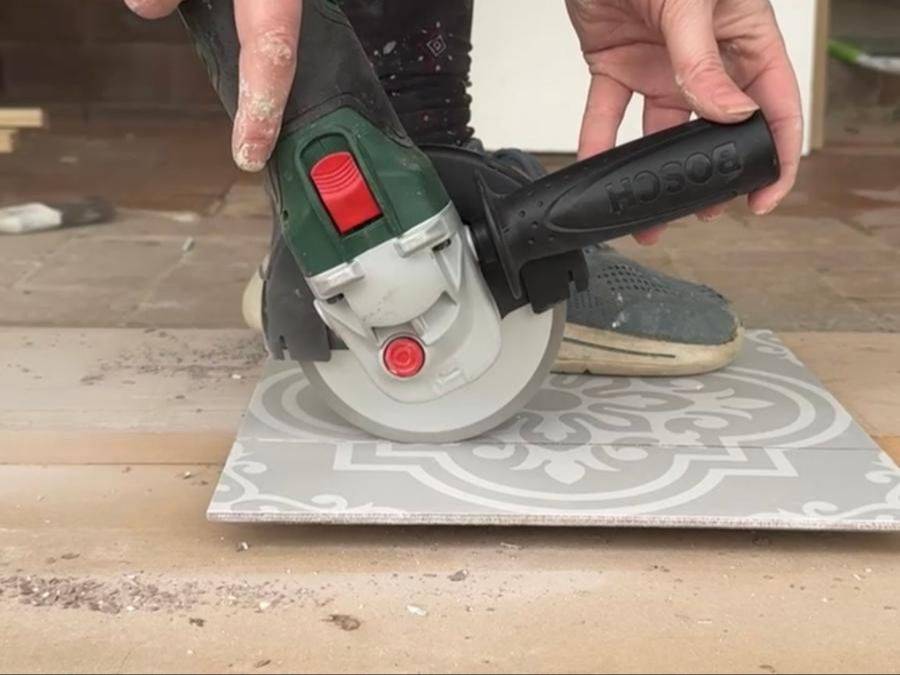 Cutting a patterned tile with an angle grinder