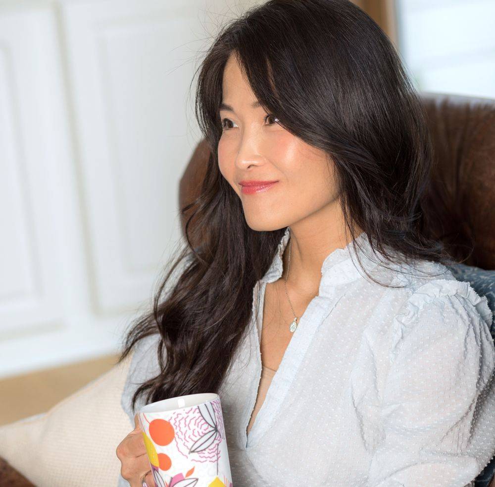 Dr. Connie Cheung relaxing with a cup of tea