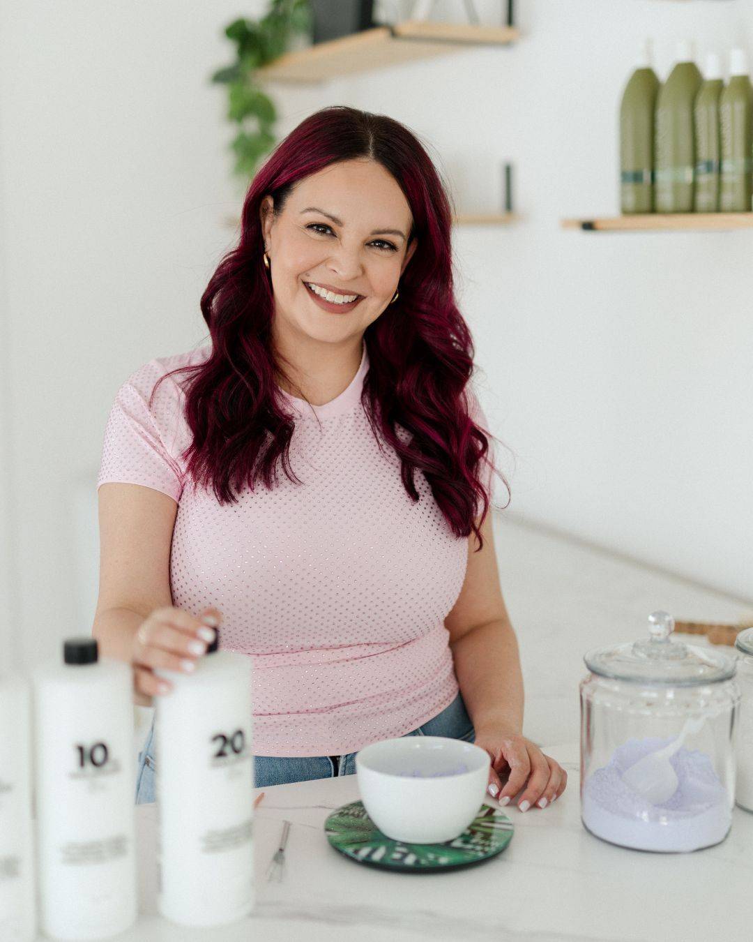Mirella Manelli mixing color at the salon counter