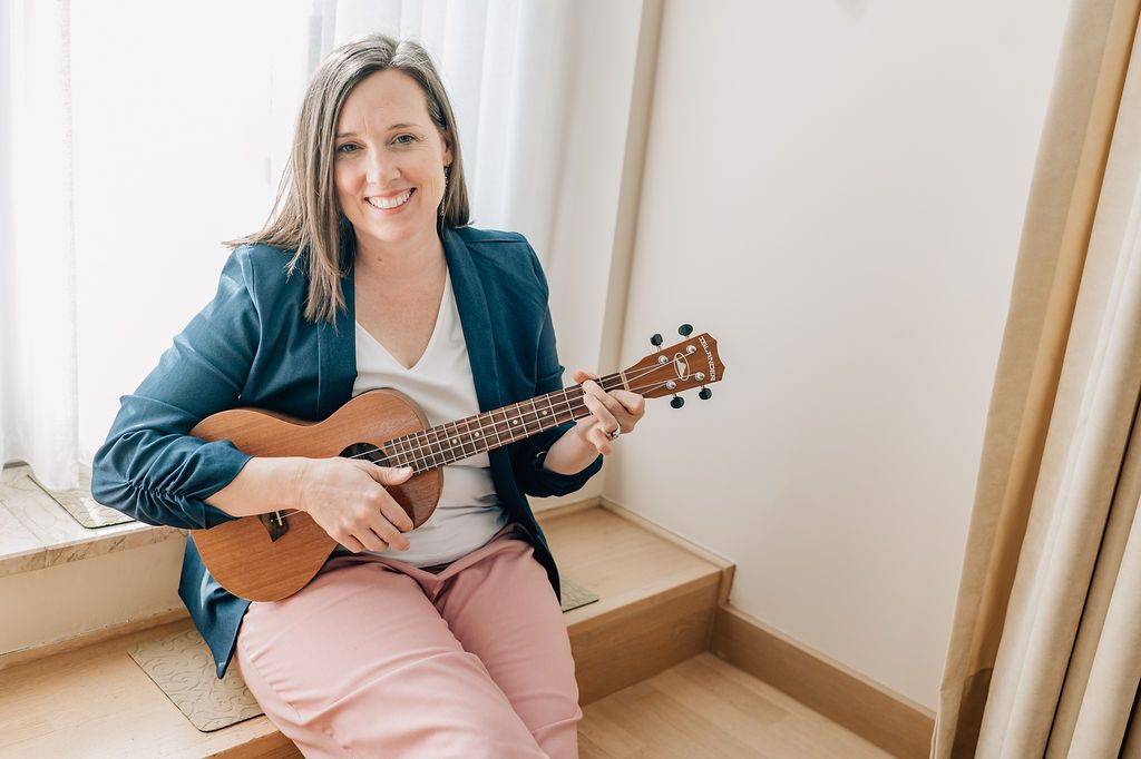 Miss Elizabeth playing the ukulele