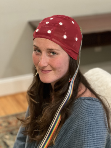 Woman wearing a qEEG cap during a brain map at Arbor Health
