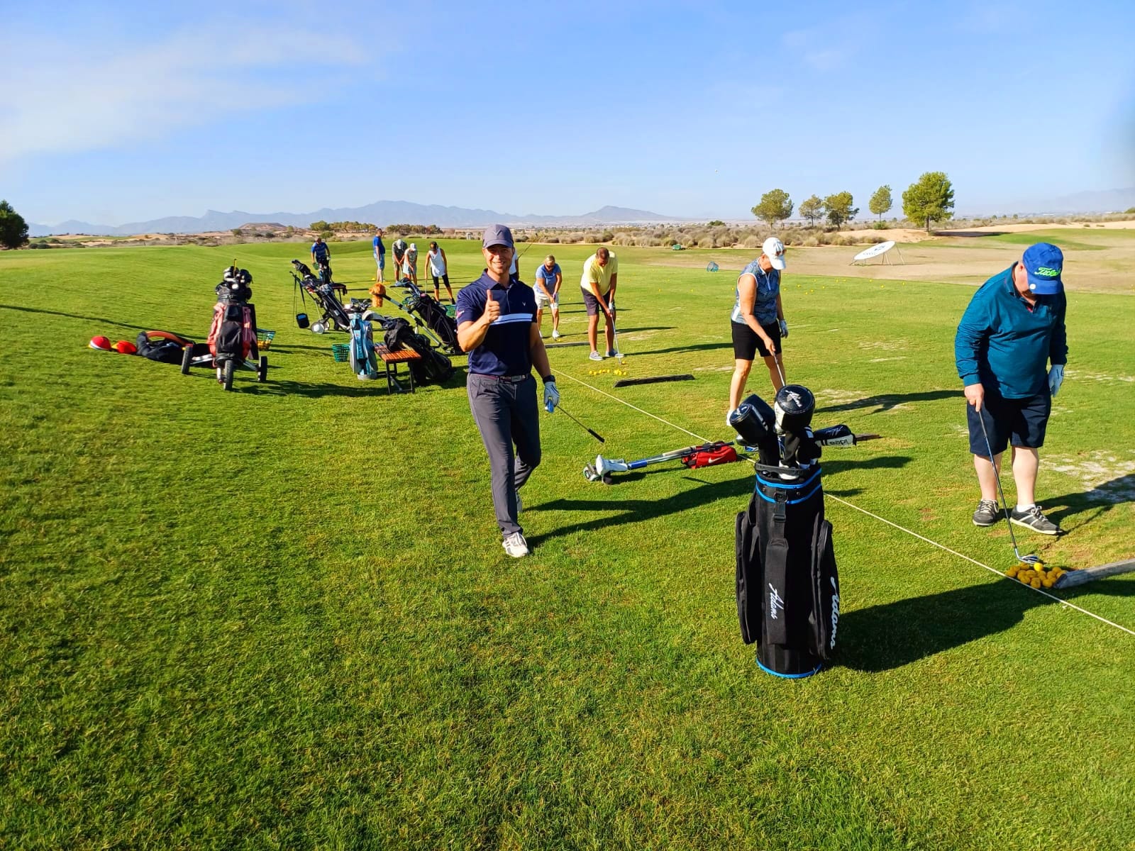 Learning and practising together at Alhama Signature Golf.