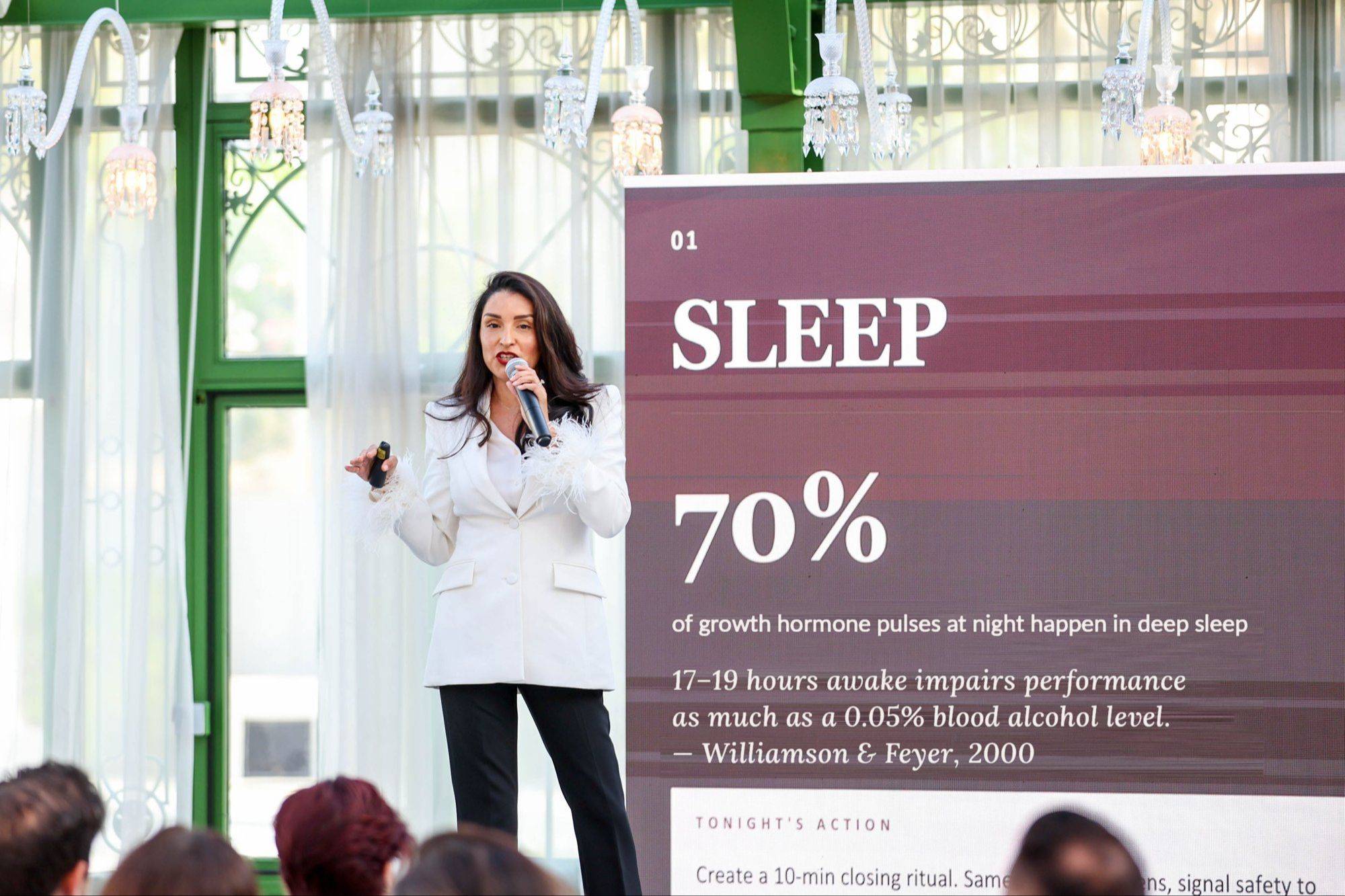 Dr. Sandy Zanella delivering a keynote on sleep
