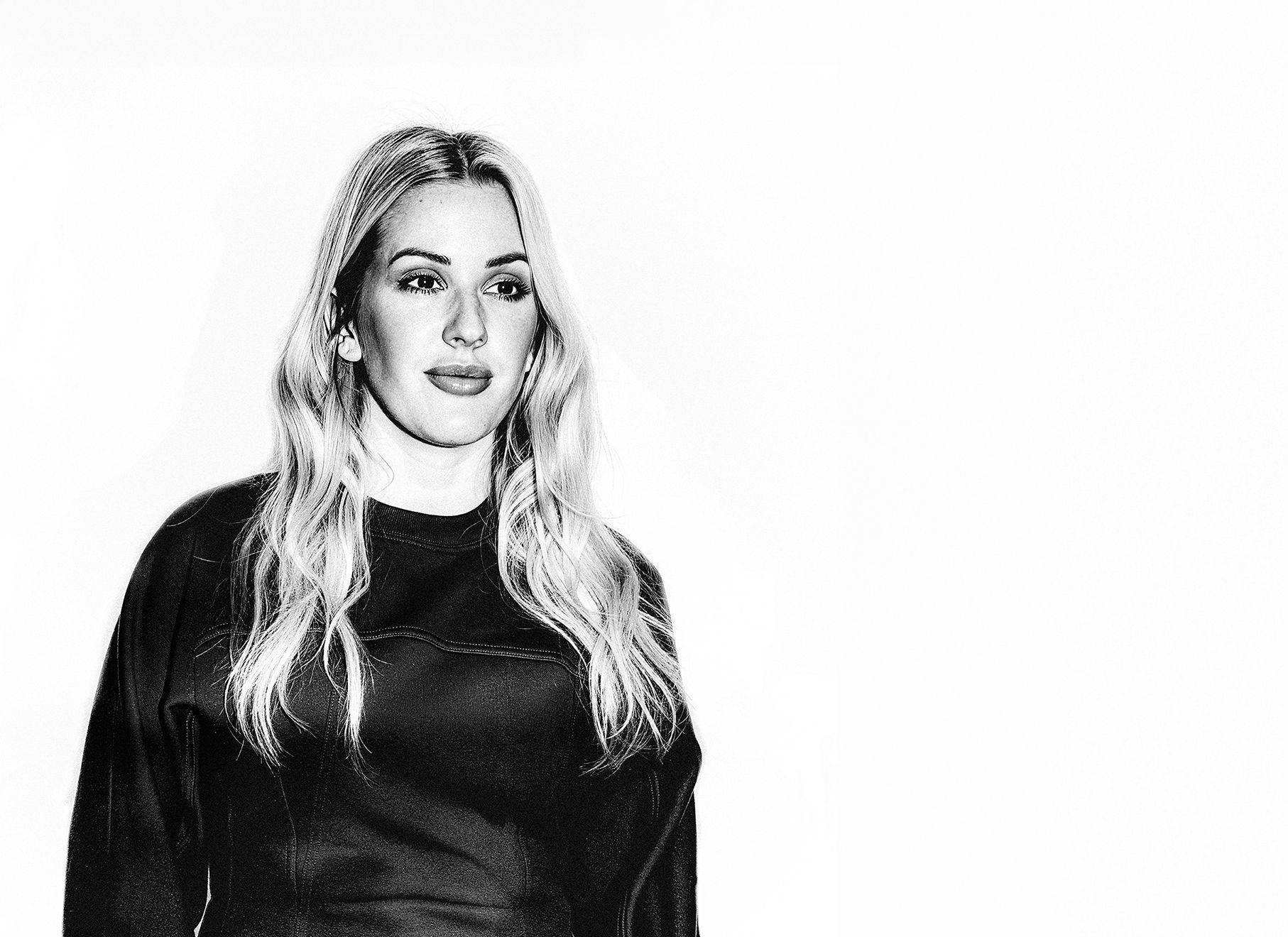 Ellie Goulding black and white portrait on a white background, portrait photography by Mark Kaye