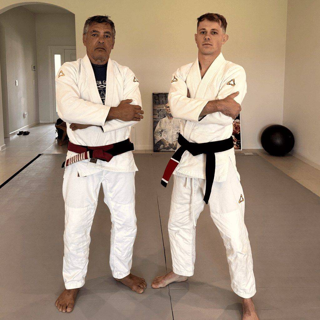 Master Rickson Gracie and Professor Darien Cobon in white gis
