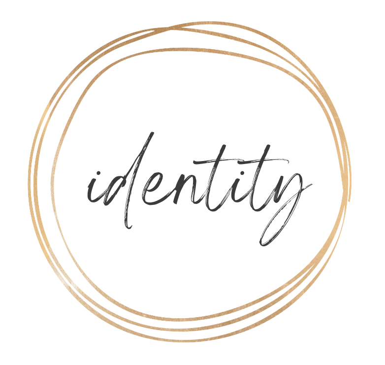 scripted font of identity inside a gold circle