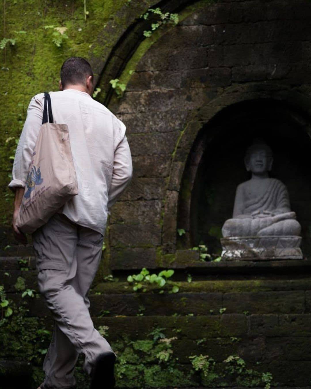 Dr Miles Neale visiting a Buddhist shrine in Bali during pilgrimage.
