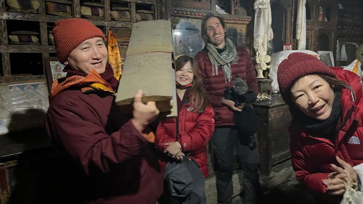 Geshe Tenzin Zopa with pilgrims inside Mu Monastery, Tsum Valley, Nepal