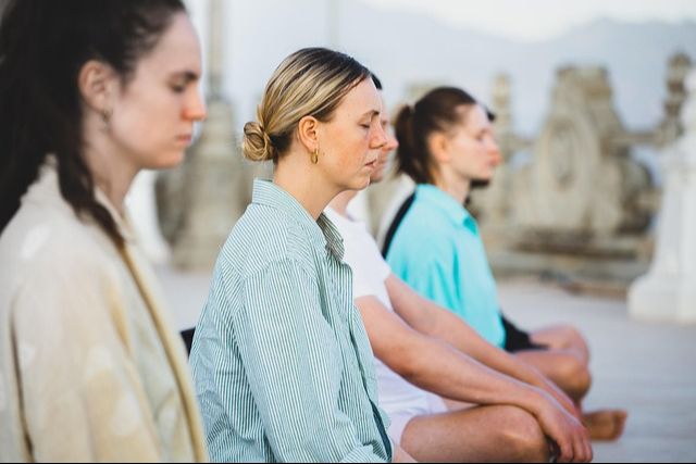 Women meditate