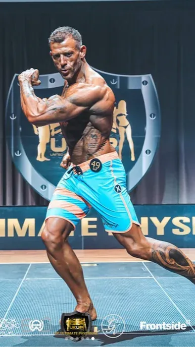 Pure Elite Winner andre dcruz mens physique comp prep client