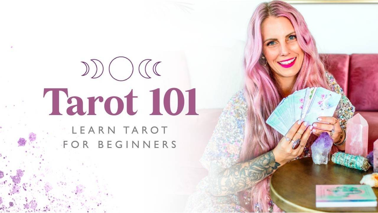 A person holding a tarot deck, symbolizing the beginning of a tarot journey