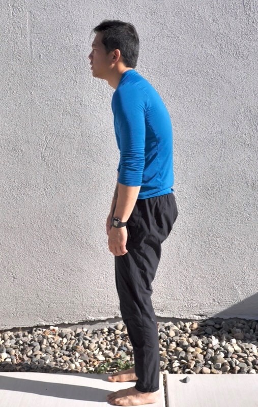 man with hunchback posture