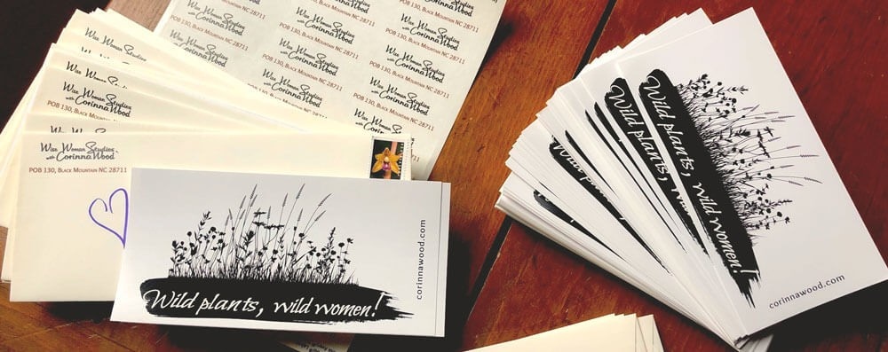 a stack of bumper stickers and envelopes