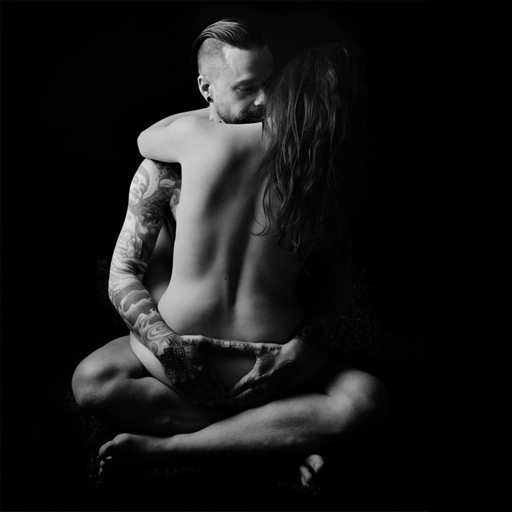 couple sitting in the Tantric position named Yab Yum