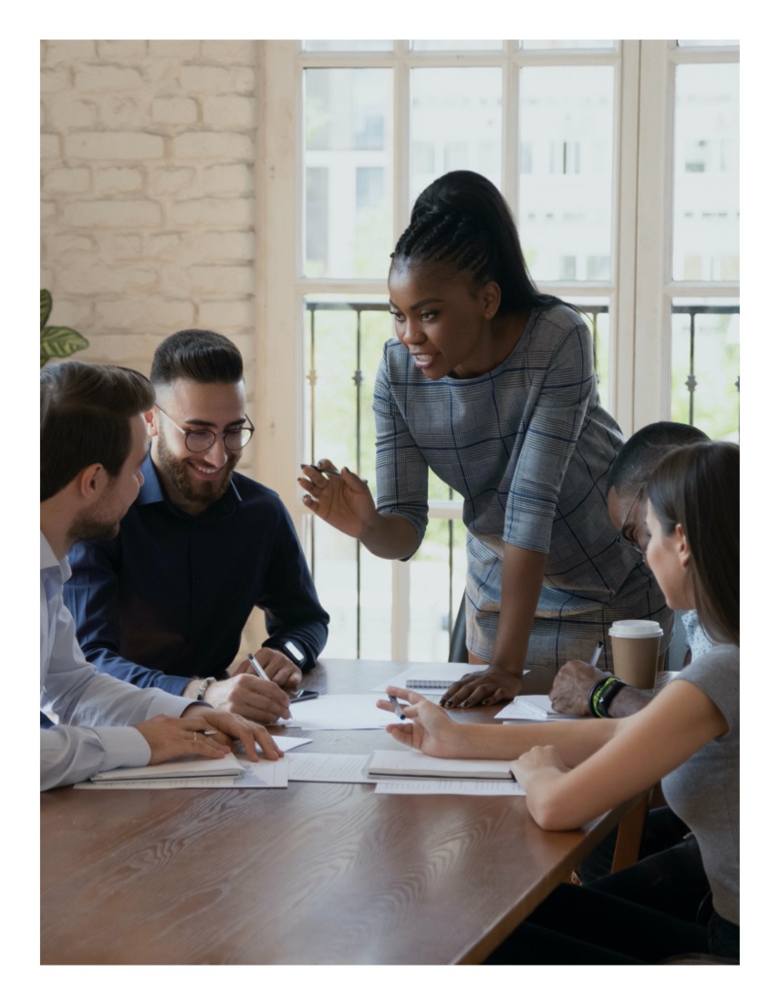 Team meeting lead by a woman